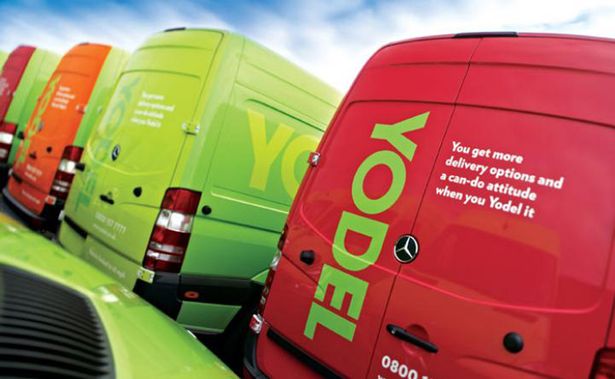 Yodel premium delivery — fleet of branded vans